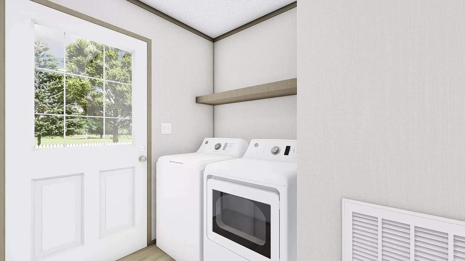 White washer and dryer in laundry room.