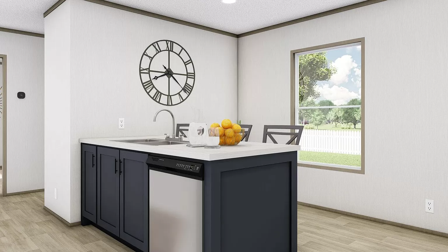 Kitchen island with sink, dishwasher, and clock.
